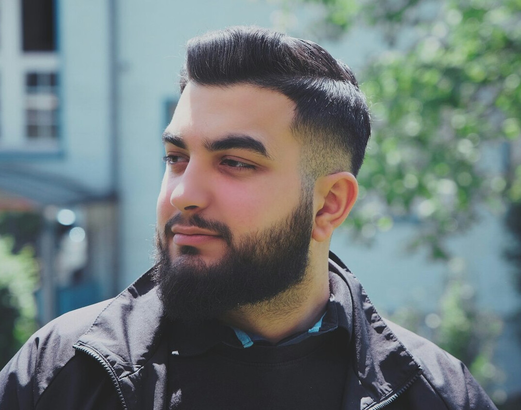 Turkish man with beard, professional headshot