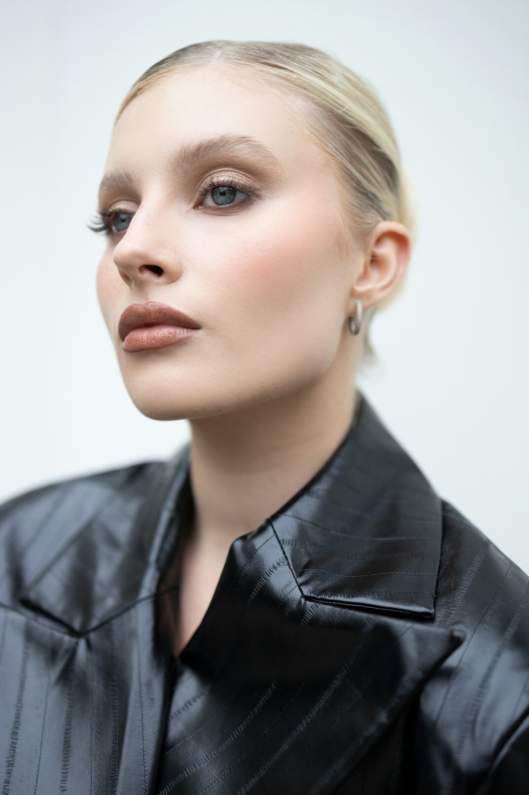 Turkish woman with short hair, professional headshot